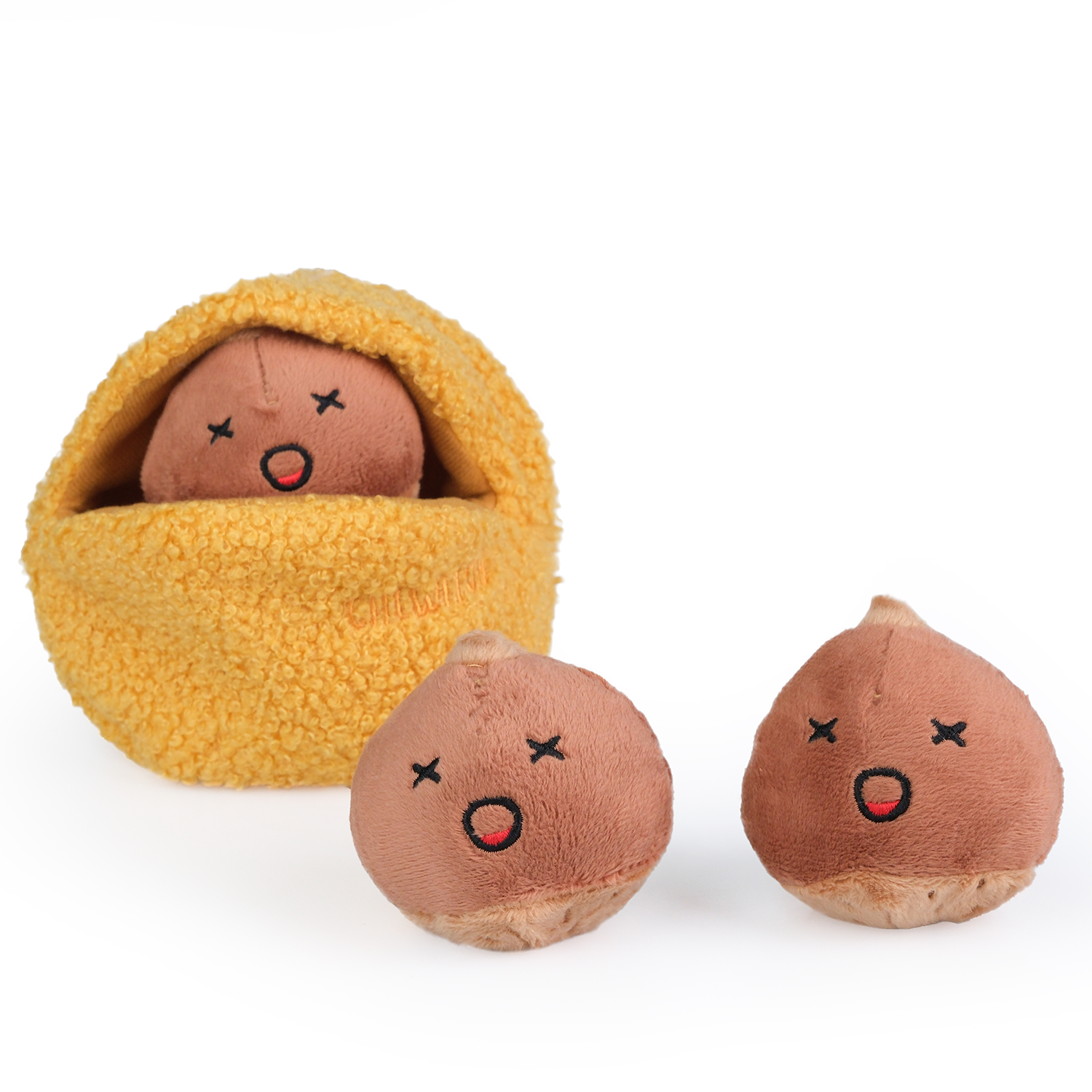 Two small brown plush toys with facial expressions and a yellow blanket on a white background
